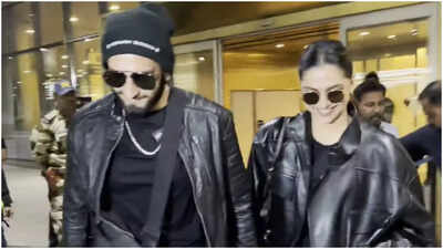 Deepika Padukone can’t stop smiling as paps call Ranveer Singh ‘Dhurandhar’ at airport after New York holiday – Watch | Hindi Movie News