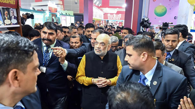 Amit Shah visits World Book Fair: Home minister distributes Anand Math to kids; urges youth to rediscover books | India News