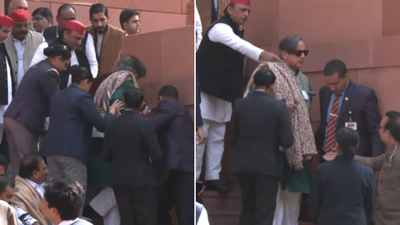 Shashi Tharoor trips and falls at Parliament stairs; Akhilesh Yadav helps – video | India News