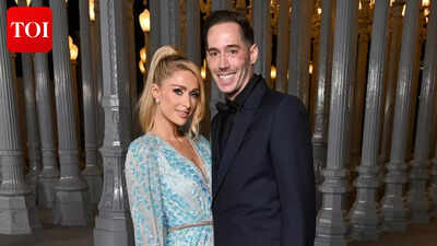 Paris Hilton’s husband, Carter Reum, says ‘she loves me to death,’ squashing the ongoing rumors about their marriage |