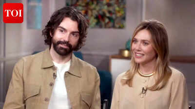 Elizabeth Olsen sparks pregnancy speculation during Los Angeles outing with husband Robbie Arnett – PICS |