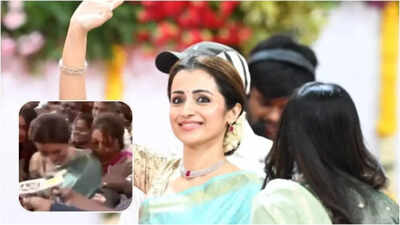 Vijay: Trisha Krishnan gets mobbed while leaving Vijay’s Tamil Nadu CM oath ceremony; handles the post-event frenzy with grace | Tamil Movie News