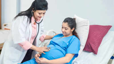 Who pays for motherhood in India?