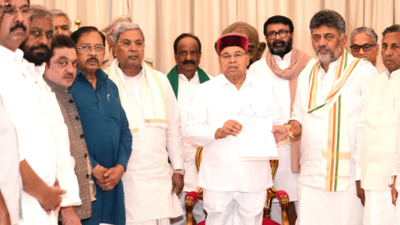 DK Shivakumar meets Karnataka governor, stakes claim to form govt | India News