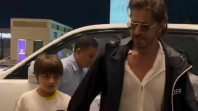 Shah Rukh Khan gets spotted at Mumbai airport with son AbRam Khan; superstar flashes his signature smile at paps – Watch |