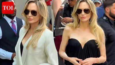 Angelina Jolie makes jaws drop at ‘Couture’ screening in New York; Actress shows off tattooed back in strapless gown – WATCH |