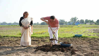 Uttarakhand CM Dhami promotes organic farming, ploughs field at private residence in Khatima | India News