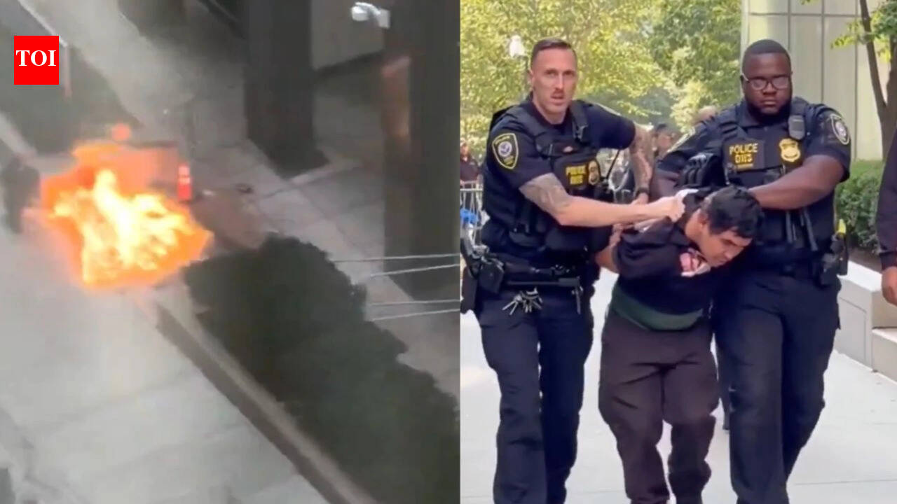 Watch: US army veteran carrying ‘ICE off our streets’ sign sets fire outside NYC federal building