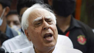 Amid mergers, Sibal urges SC to interpret law on defection curbs | India News