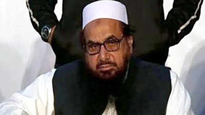 NIA court issues non-bailable warrant for Hafiz Saeed; calls for crackdown on terror financing and networks | India News