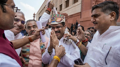 ‘Garlanded as if he won a war’: Opposition attacks BJP over Dharmendra Pradhan’s felicitation after resignation | India News