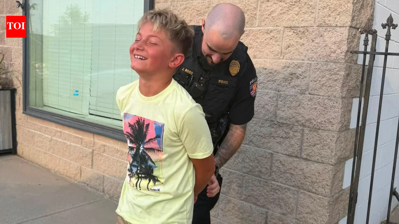 Colorado mom gets her son ‘arrested’ by police after he refuses to take a first-day-of-school photo, with officer handcuffing him in hilarious prank
