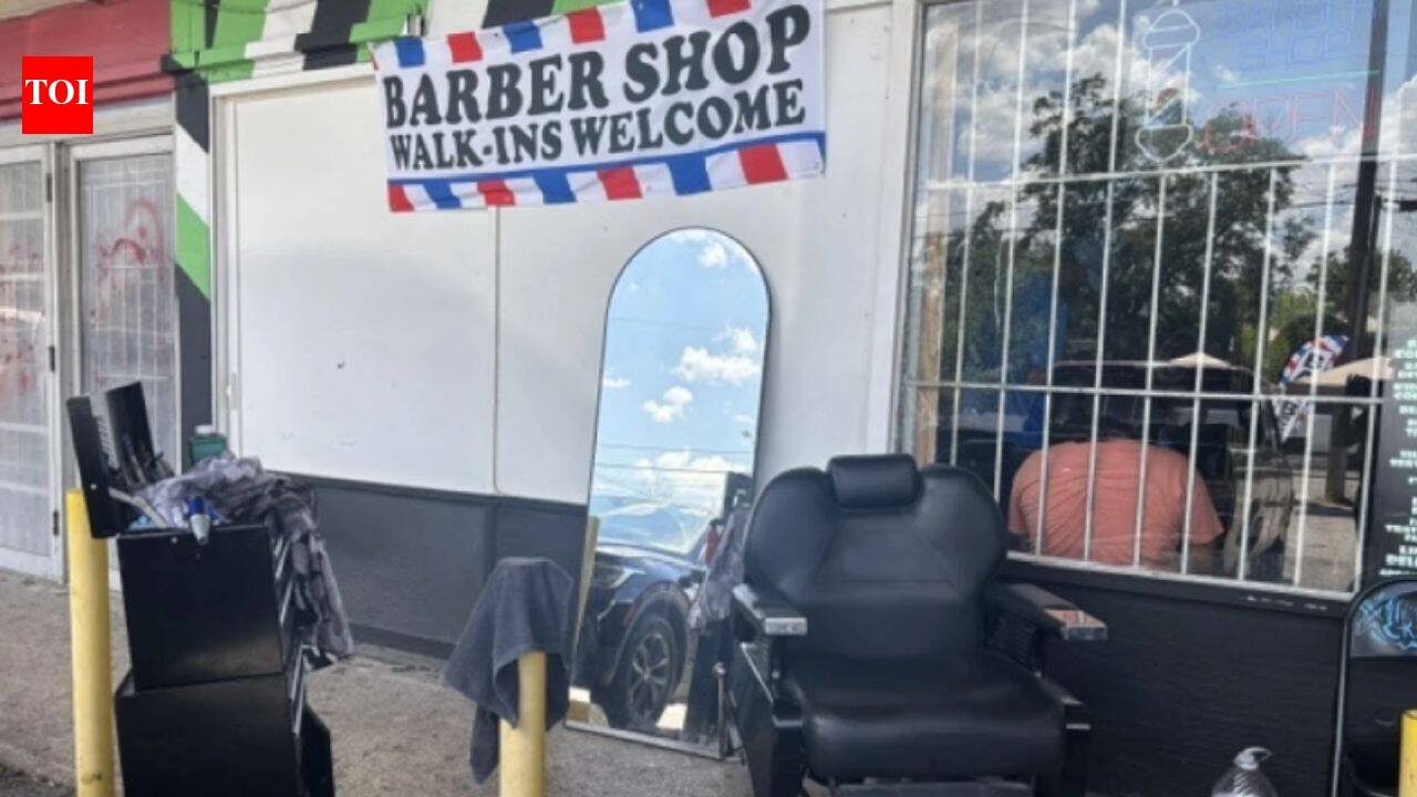 A San Antonio storm knocked out power and damaged homes; one barber simply moved his chair outside and kept cutting customers’ hair
