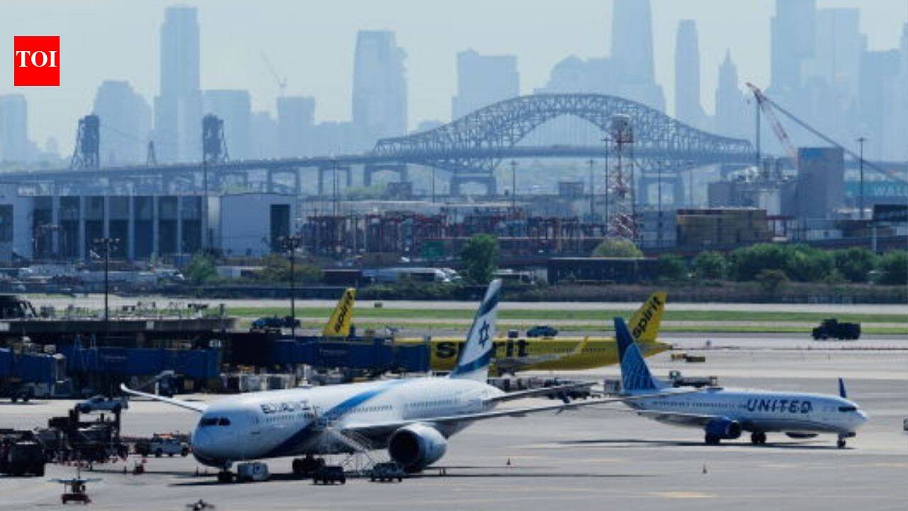 13 injured as shuttle bus crashes into barrier at Newark Airport