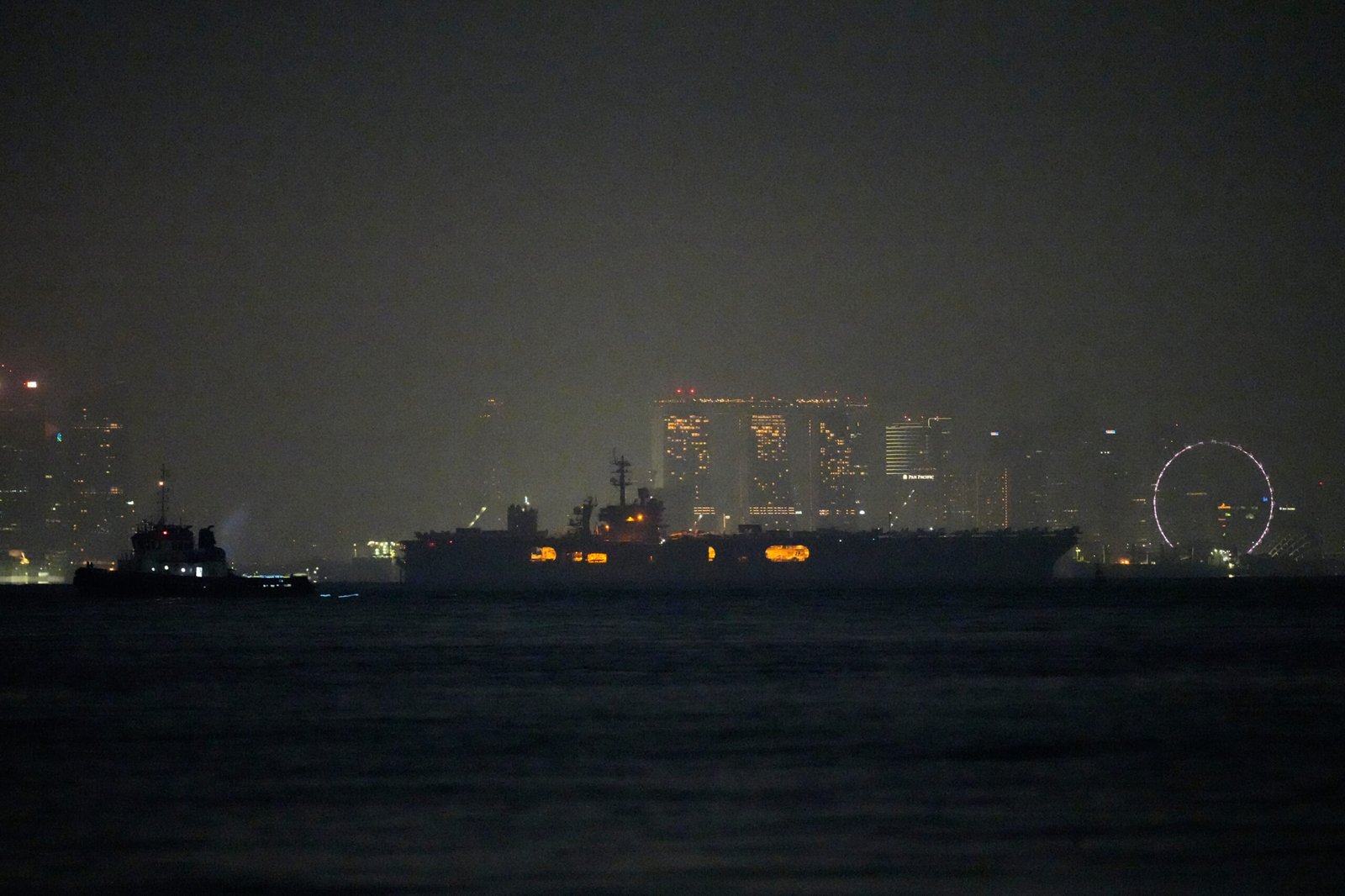 USS Abraham Lincoln sails past Singapore on way home from Middle East