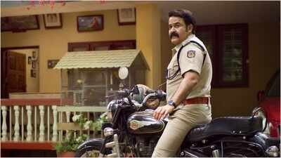 Mohanlal shares Onam poster of ‘Athimanoharam’; actor appears as cop TS Lovelajan; reunites with Meera Jasmine | Malayalam Movie News
