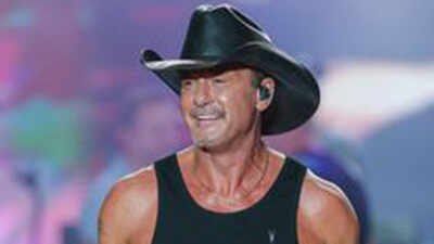 Tim McGraw falls from platform while performing in Cincinnati, laughs off incident and tells fans ‘there’s hole there’ |
