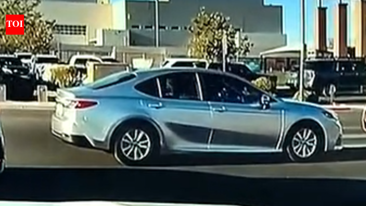 A Las Vegas crossing guard steps in front of speeding car as it bears down on mother, 2 children; came within 10 feet