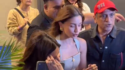 Alia Bhatt’s bodyguard pushes away fan trying to click selfie with her; netizens react as video goes viral | Hindi Movie News