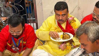 Suvendu Adhikari eats fish bhog at Kalighat amid Bageshwar Baba row: What sparked the controversy? | India News