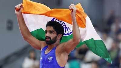 Screensaver turns real: Aman Sehrawat’s gold on phone now around his neck | Asian Games 2026 News