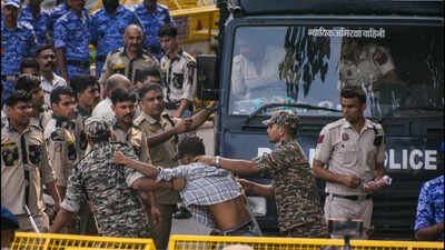 Stones hurled at bus carrying detained protesters in Delhi’s Jhandewalan, cops injured | India News