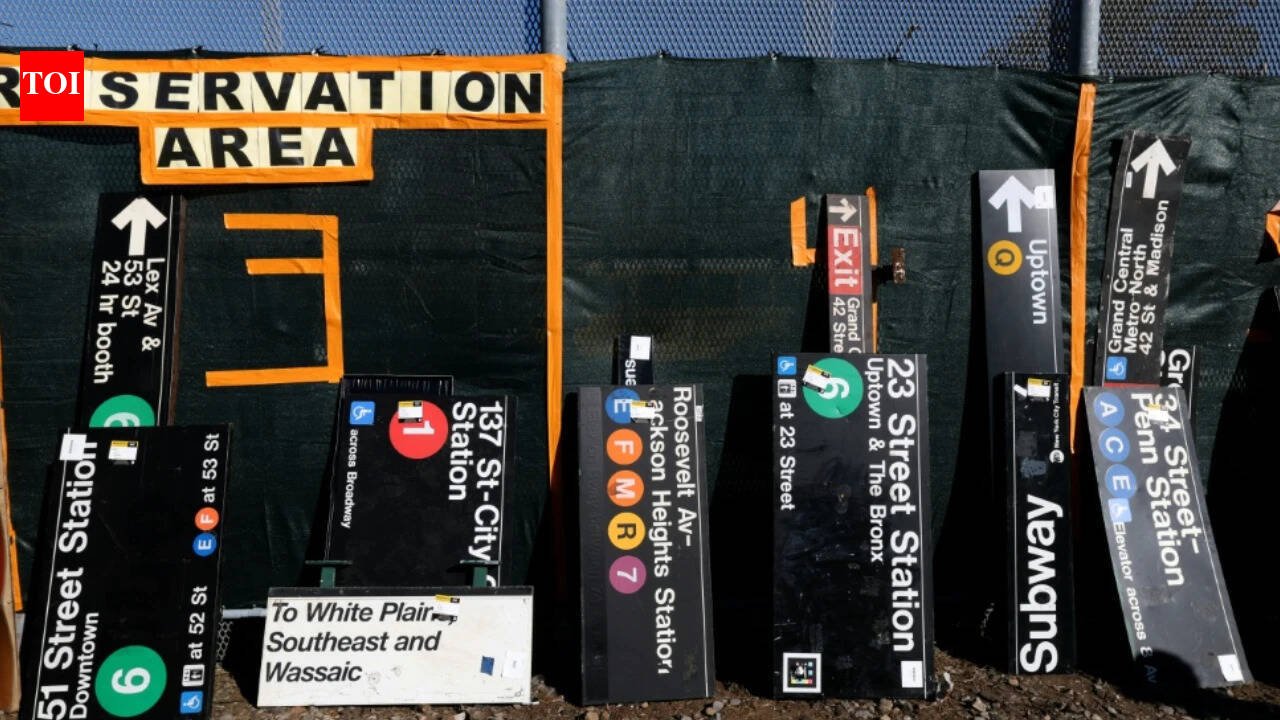 New Yorkers queued for hours to buy discarded subway hardware at an MTA sale where old signs cost $500 to over $1,000, orange seats sold for about $900 and Spike Lee picked up a Penn Station sign