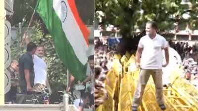 Rahul Gandhi: Watch: Rahul Gandhi climbs barricades, waves Tricolour as cops stop INDIA bloc march against CEC | India News