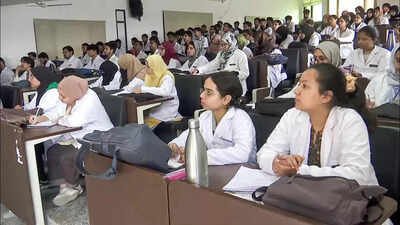 Kashmir professor removed for ‘harassing’ students | India News
