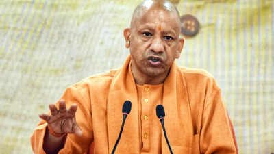CM Yogi Adityanath hails PM Modi on 25 years as head of govt, says he presented Gujarat as model State | India News